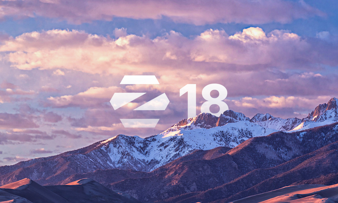 The Zorin OS 18 default wallpaper with an overlaid Zorin logo with the number 18 beside it.